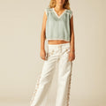 WHITE PANTS WITH EMBROIDERED TRIM
