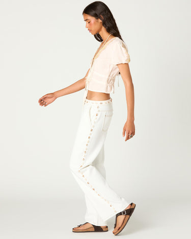 PANTALON DENIM CONCHAS