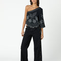 BLACK DENIM SIDE BUTTON FLOWER