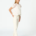 White flared denim pants