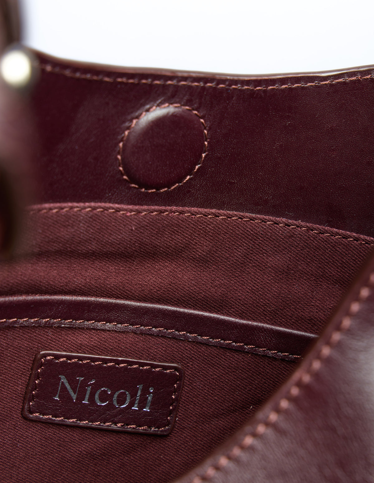 BOLSO CINTURÓN BURGUNDY