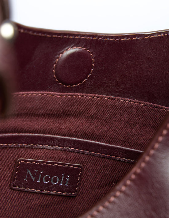 BOLSO CINTURÓN BURGUNDY