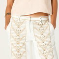 EMBROIDERED WHITE DENIM JEANS