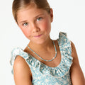 SWIMSUIT WITH TOILE POND RUFFLE