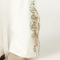 WHITE COWBOY STUDDED JEANS