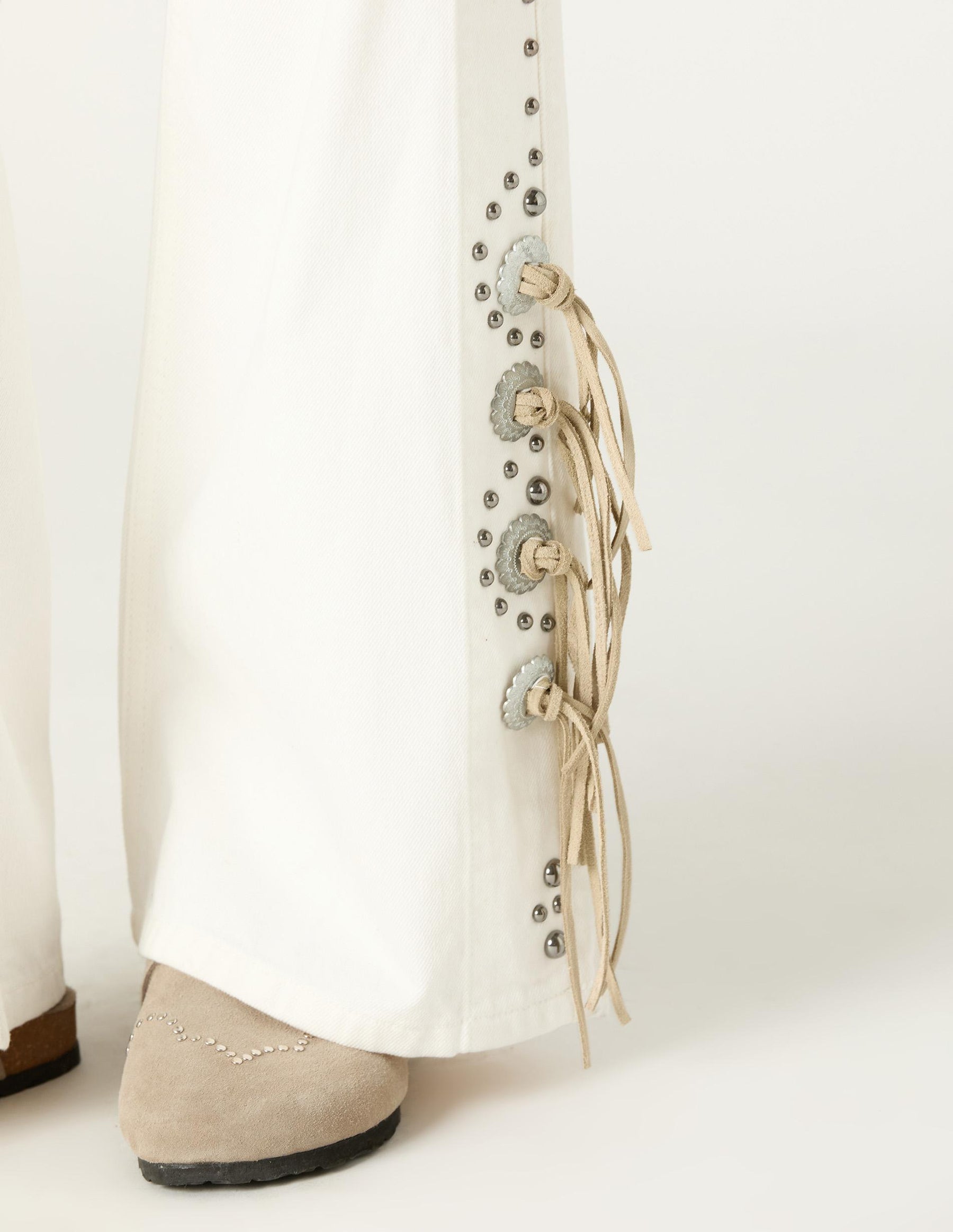 WHITE COWBOY STUDDED JEANS