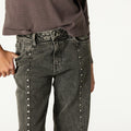 DISTRESSED GREY DENIM TROUSERS