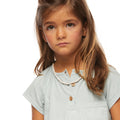Light green short-sleeved button-up shirt