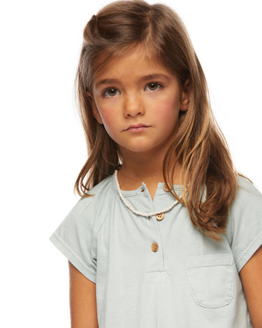Light green short-sleeved button-up shirt