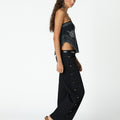 BLACK EMBROIDERED ASYMMETRICAL TOP