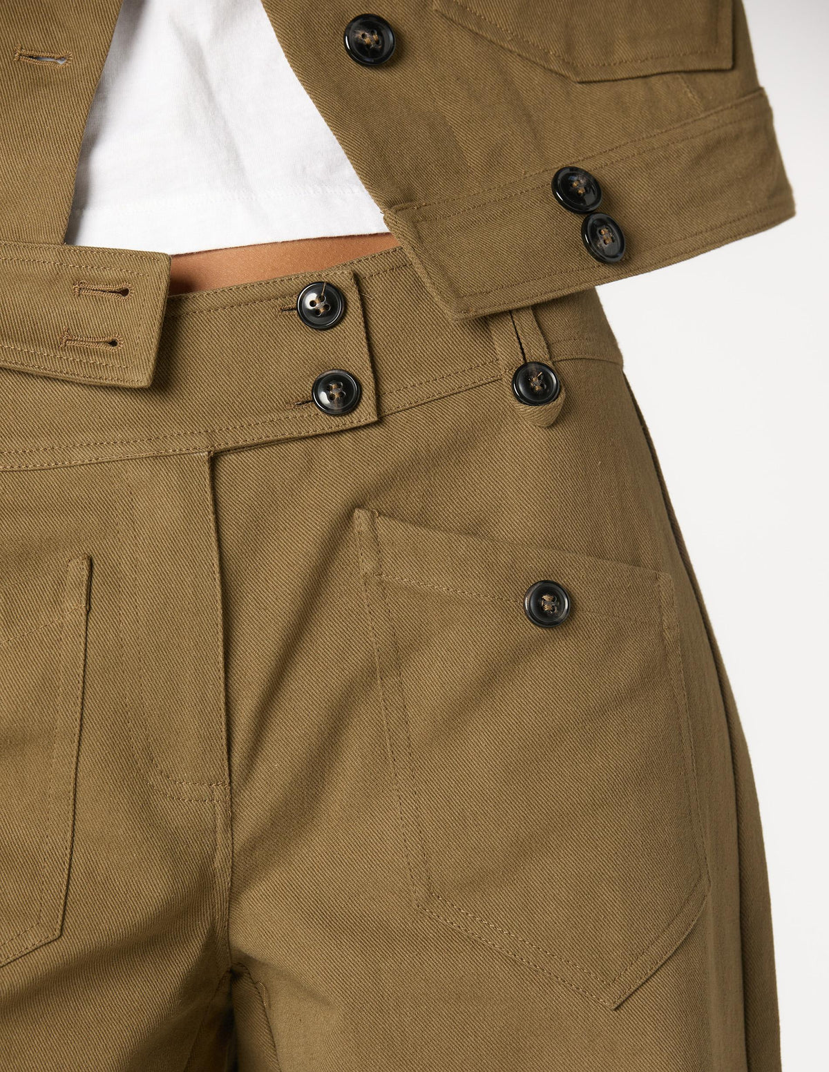 KHAKI TROUSERS WITH BUTTON POCKETS