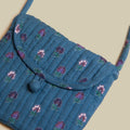 BANDOLERA REDONDA BLOSSOM