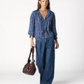 BLUE DENIM BUCKLE TROUSERS