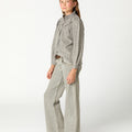 PANTALÓN GRIS CLARO TACHAS MINI