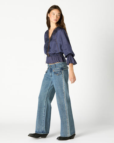 PANTALÓN DENIM TAPETA TACHAS BLUE