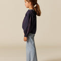 PANTALÓN BOLSILLOS VAQUERO RAYA AZUL