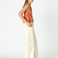 ORANGE BUTI STRAP TOP