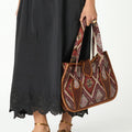 BOLSO TAPESTRY Y PIEL