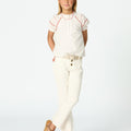 White flared denim pants