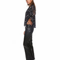 Pantalón piel campana cortes