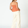 ORANGE BUTI STRAP TOP