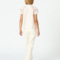 White flared denim pants