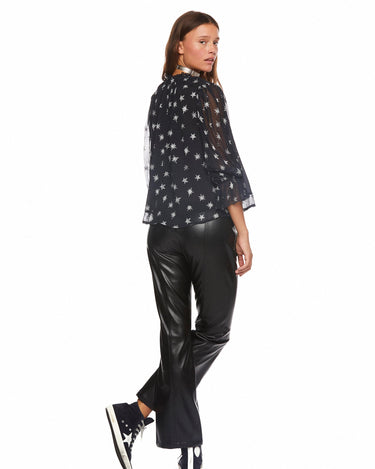Pantalón piel campana cortes