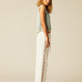 WHITE PANTS WITH EMBROIDERED TRIM