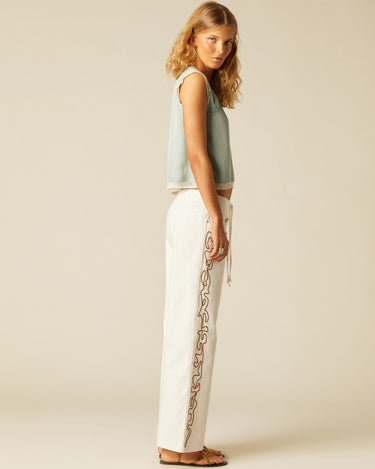WHITE PANTS WITH EMBROIDERED TRIM