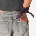 PANTALÓN HEBILLAS GRIS