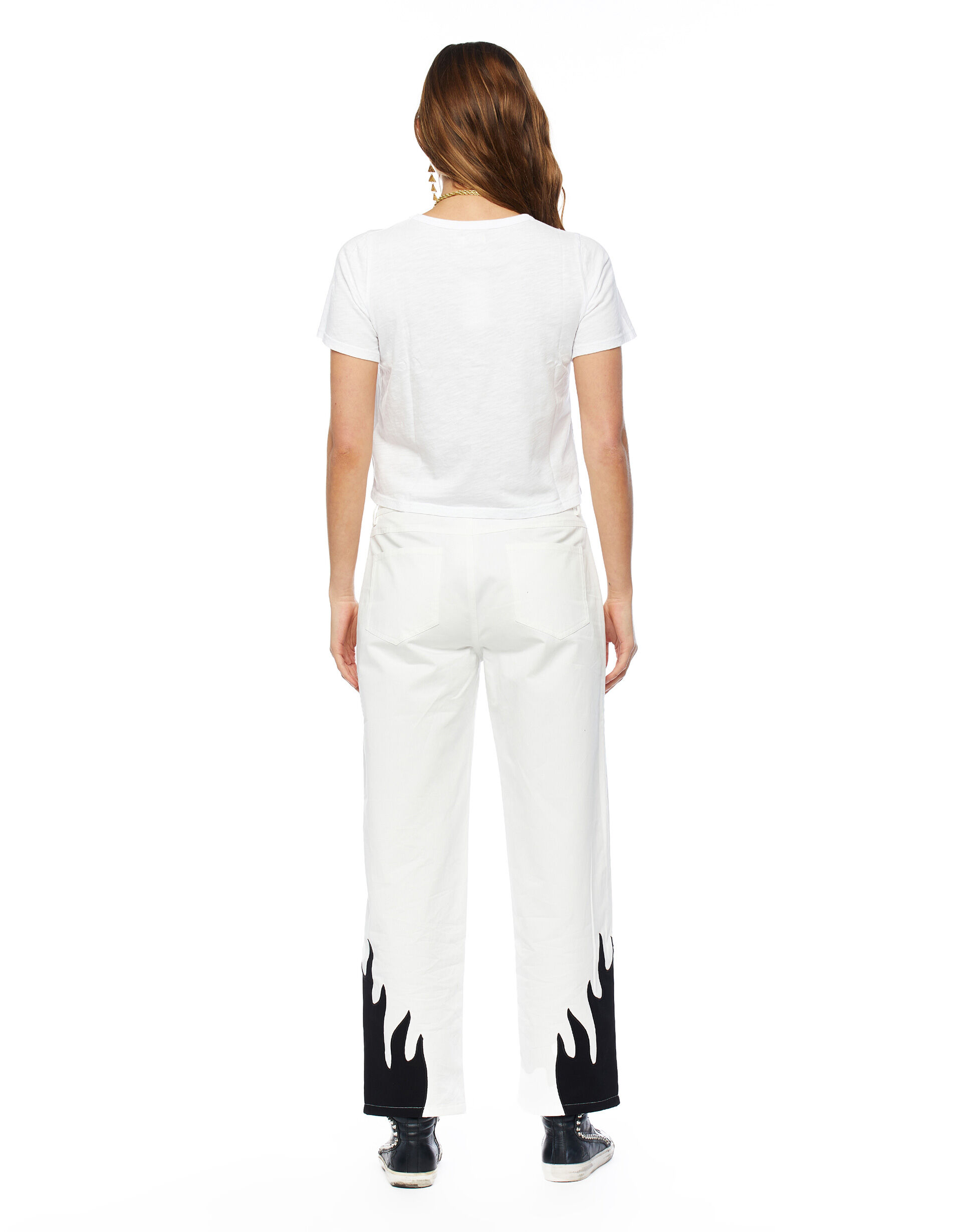 White jeans deals with black flames